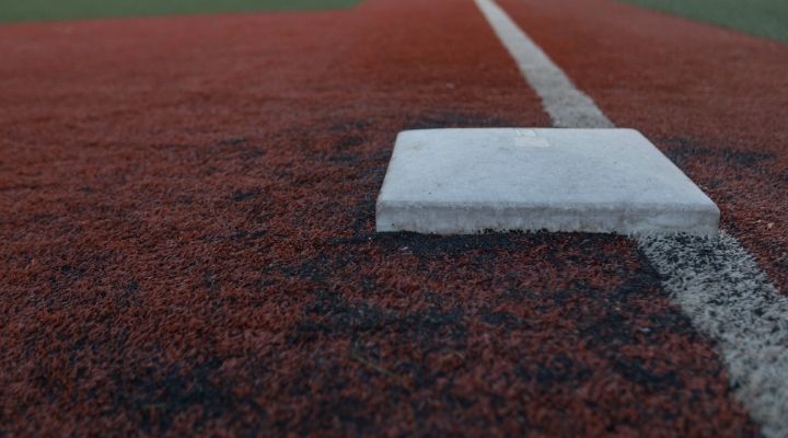 A view of third base down the line in a turf field